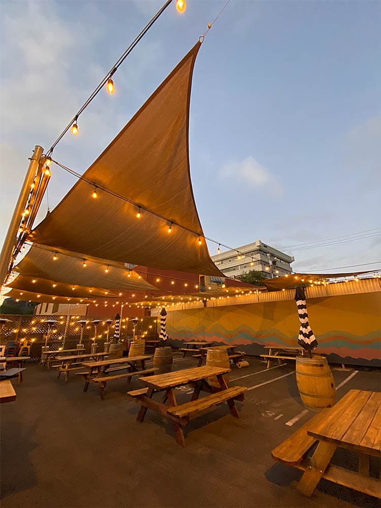 Berkeley Covered Patio With String Lights In The Evening