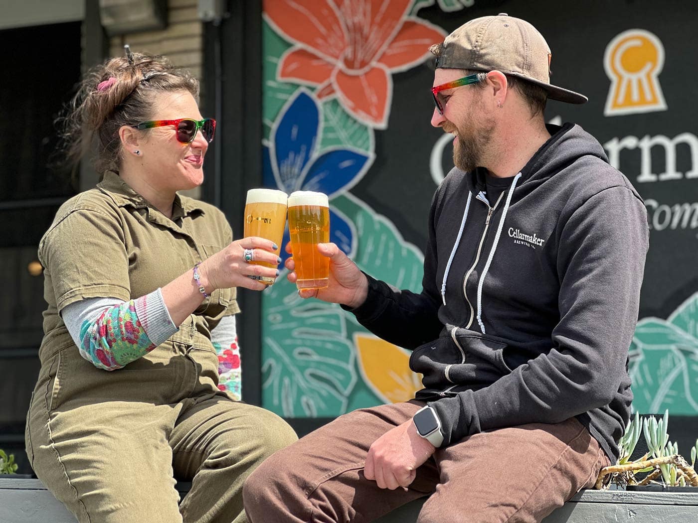 Kelly And Jeff Cheers With Front Mural