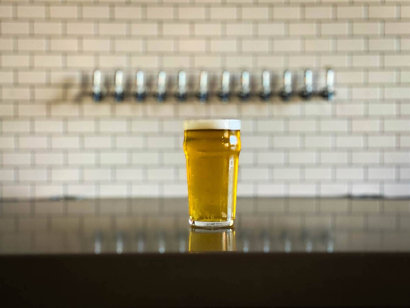 Pint On Counter With Taps Behind